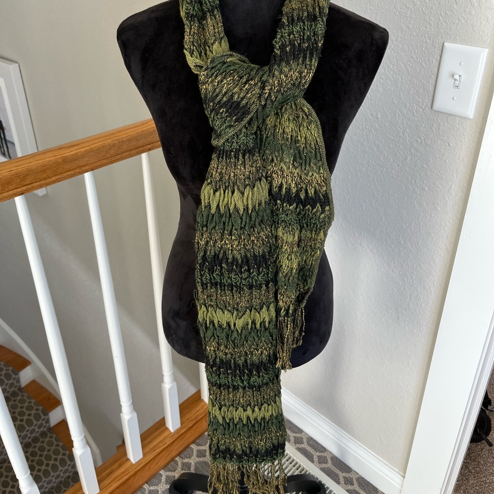 Shares of green fringed scarf
